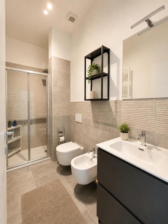 Bathroom with shower at Trieste Luxury Apartment